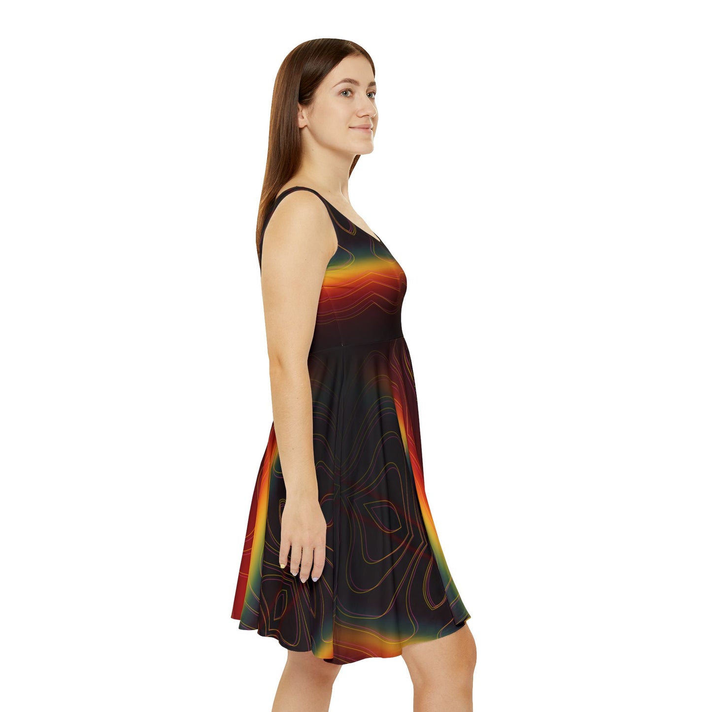 Woman wearing a sleeveless dress with a colorful rainbow pattern on a white background