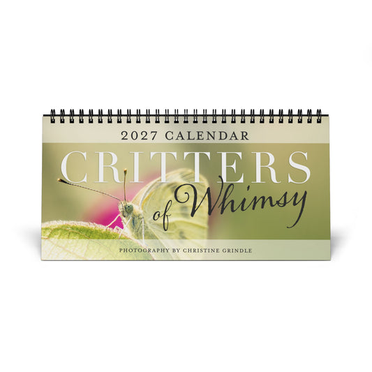 Critters of Whimsy 2027 calendar cover featuring a close-up butterfly photograph by Christine Grindle