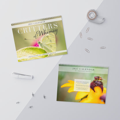 Front and back covers of the Critters of Whimsy 2027 wall calendar, featuring a Cabbage White butterfly and a Flower Fly on a yellow flower